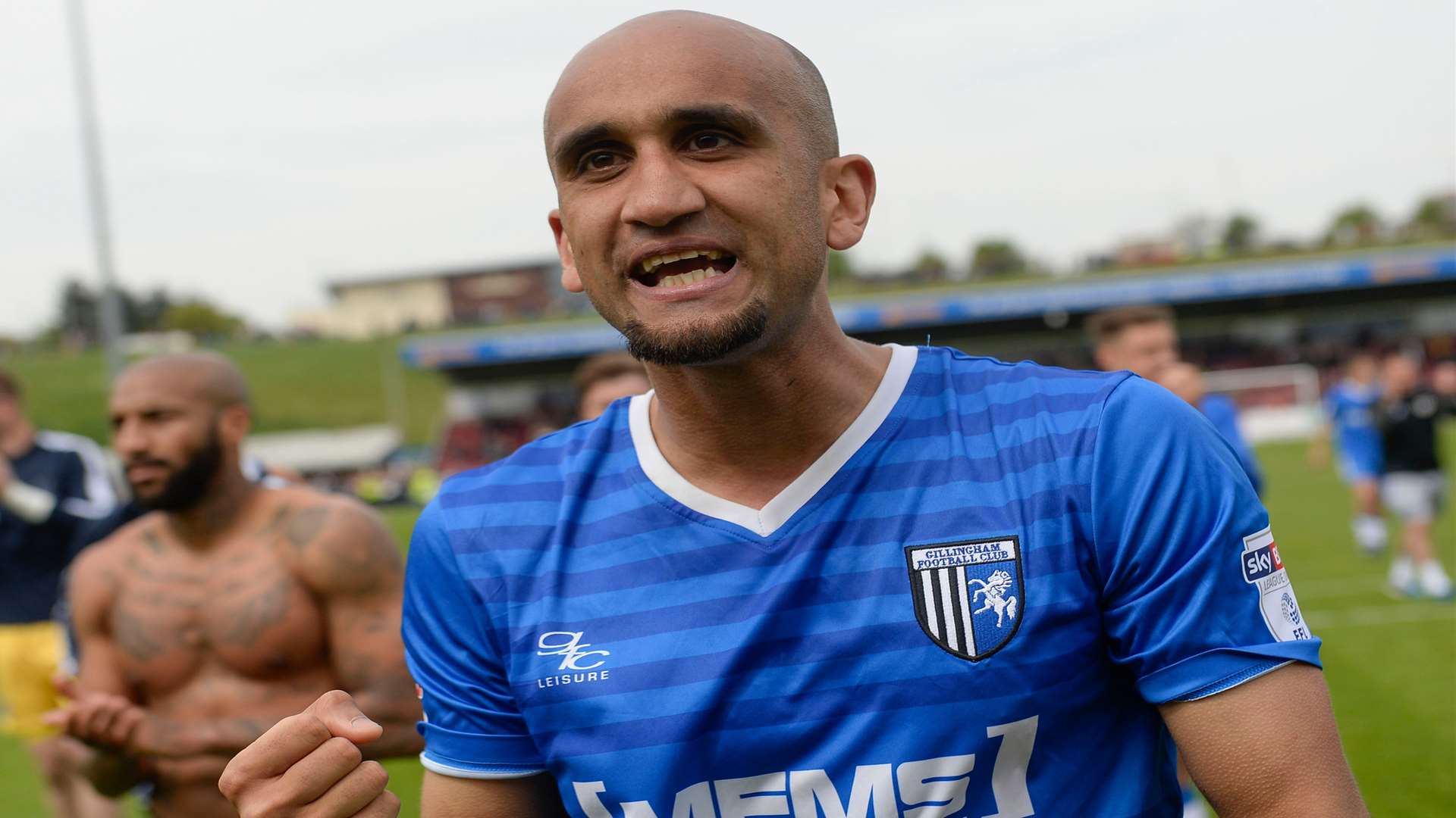 A fist-pumping Zesh Rehman celebrates Gillingham's survival at Northampton Picture: Ady Kerry