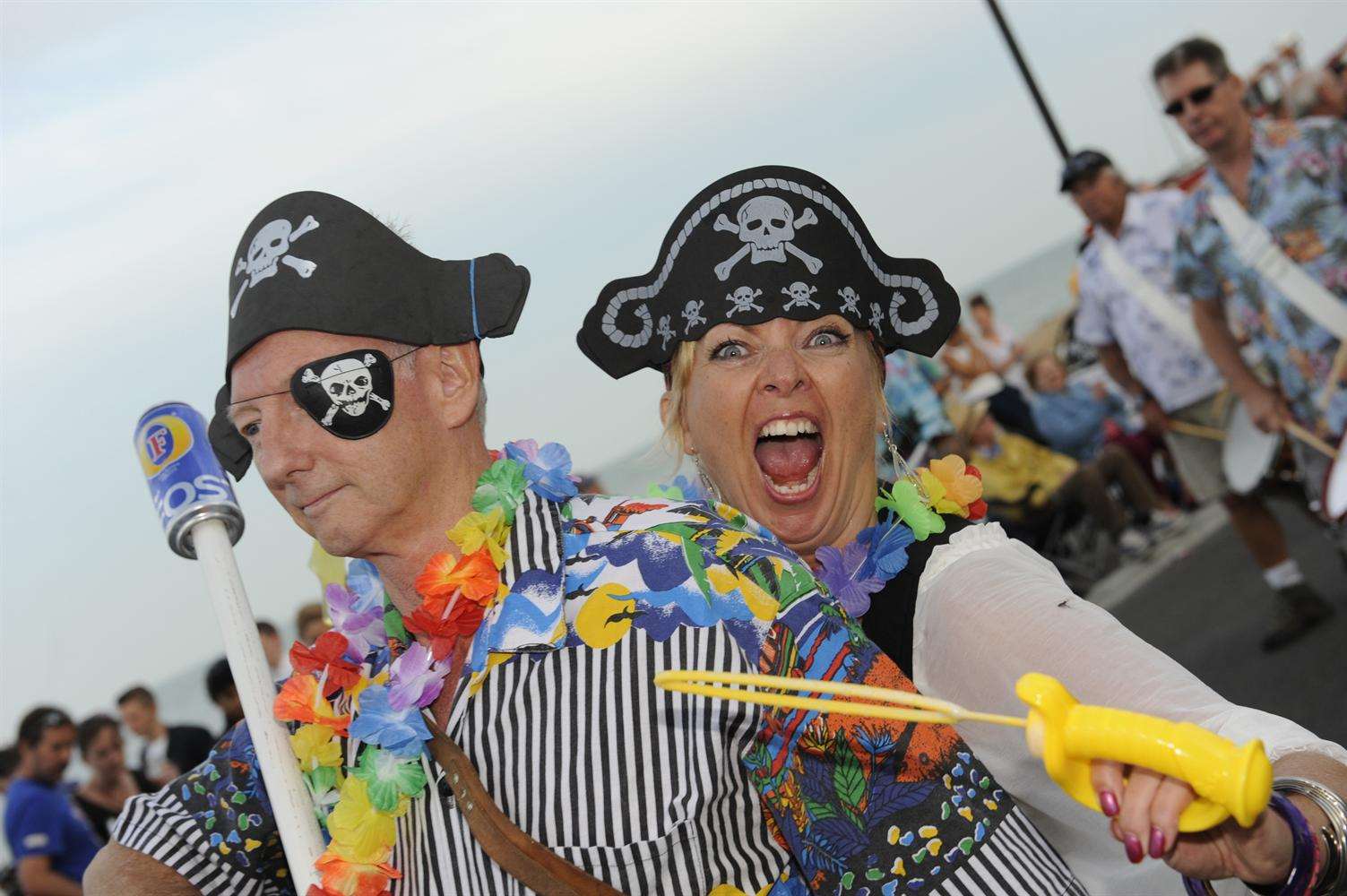 Derek Lindars and Vanessa Short dressed as pirates, promoting the Sergeants' Mess Panto Pirates of the Curried Bean