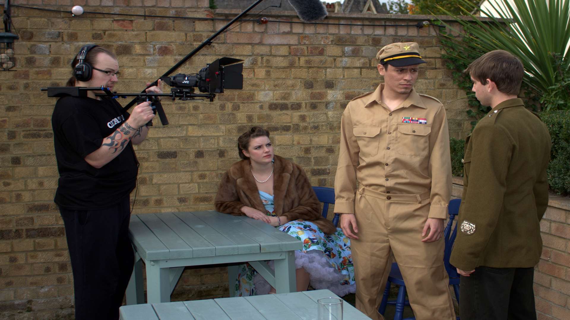 Operation OMO being filmed in Rochester (l-r) with director Colin Marrison, Medway Messenger reporter Lizzie Massey, GI Caleb played by James Chick and Charlie Hayworth played by Daniel Casper (Picture: www.relativephotography.co.uk)