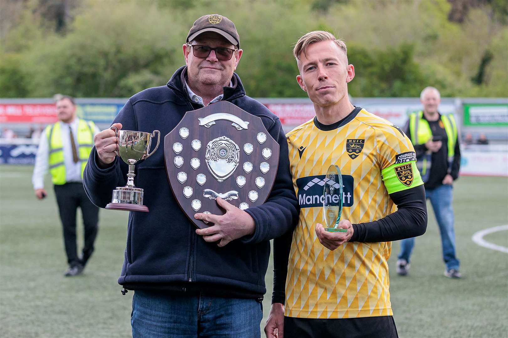 Sam Corne receives the Maidstone supporters' player-of-the-year prize from Tim Murrell. Picture: Helen Cooper