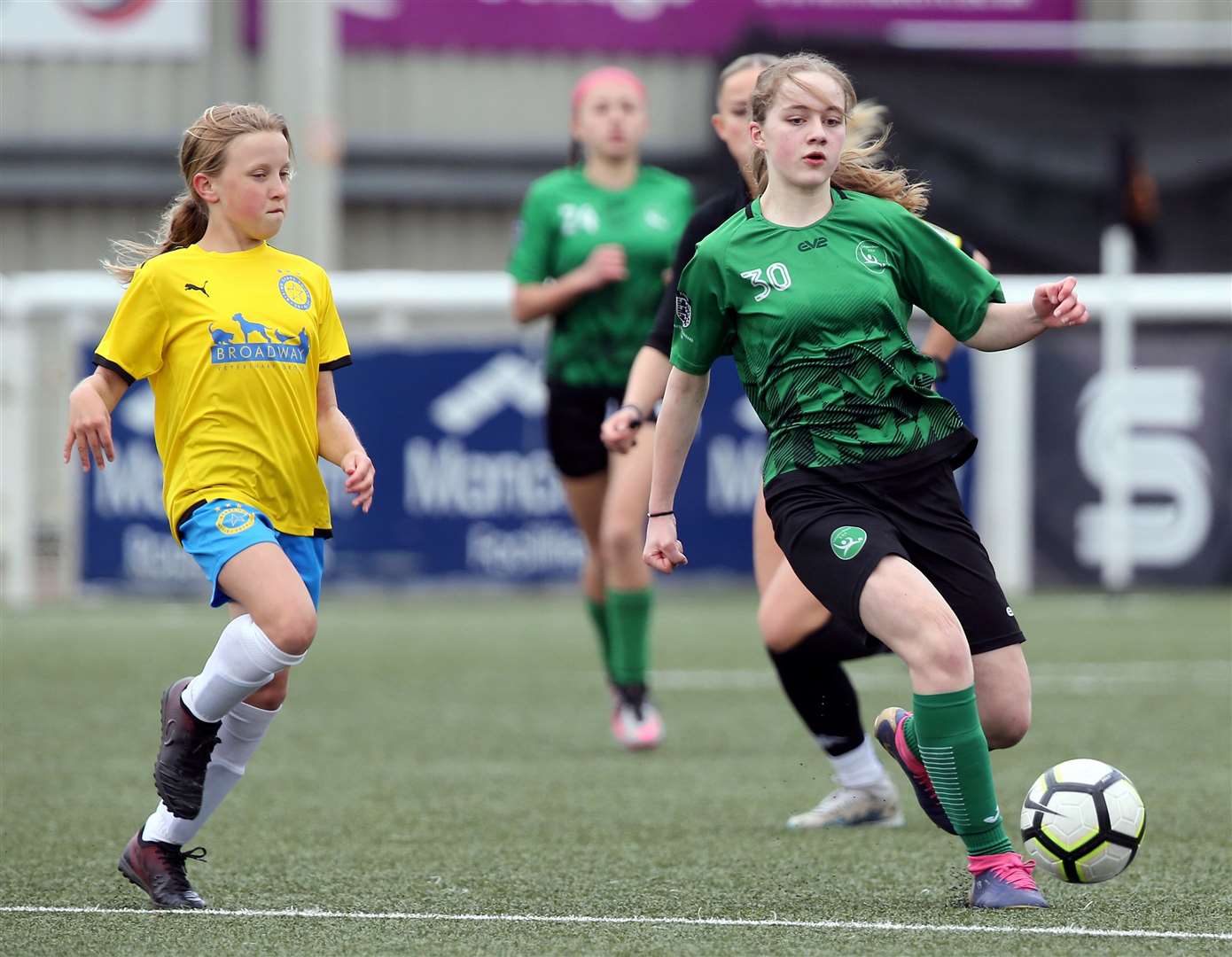 Langton Green’s Olivia Mulholland brings the ball forward during the Kent Merit Under-13 Girls Cup Final. Picture: PSP Images