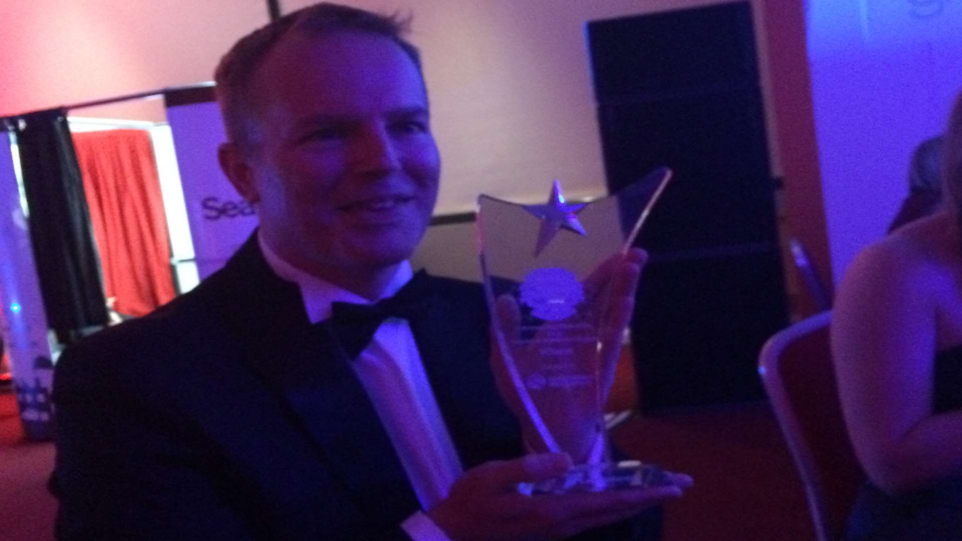 Partner Kevin Denny with the award