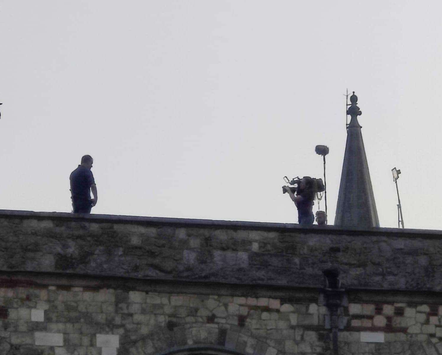 Men were spotted on the roof of Rochester Cathedral