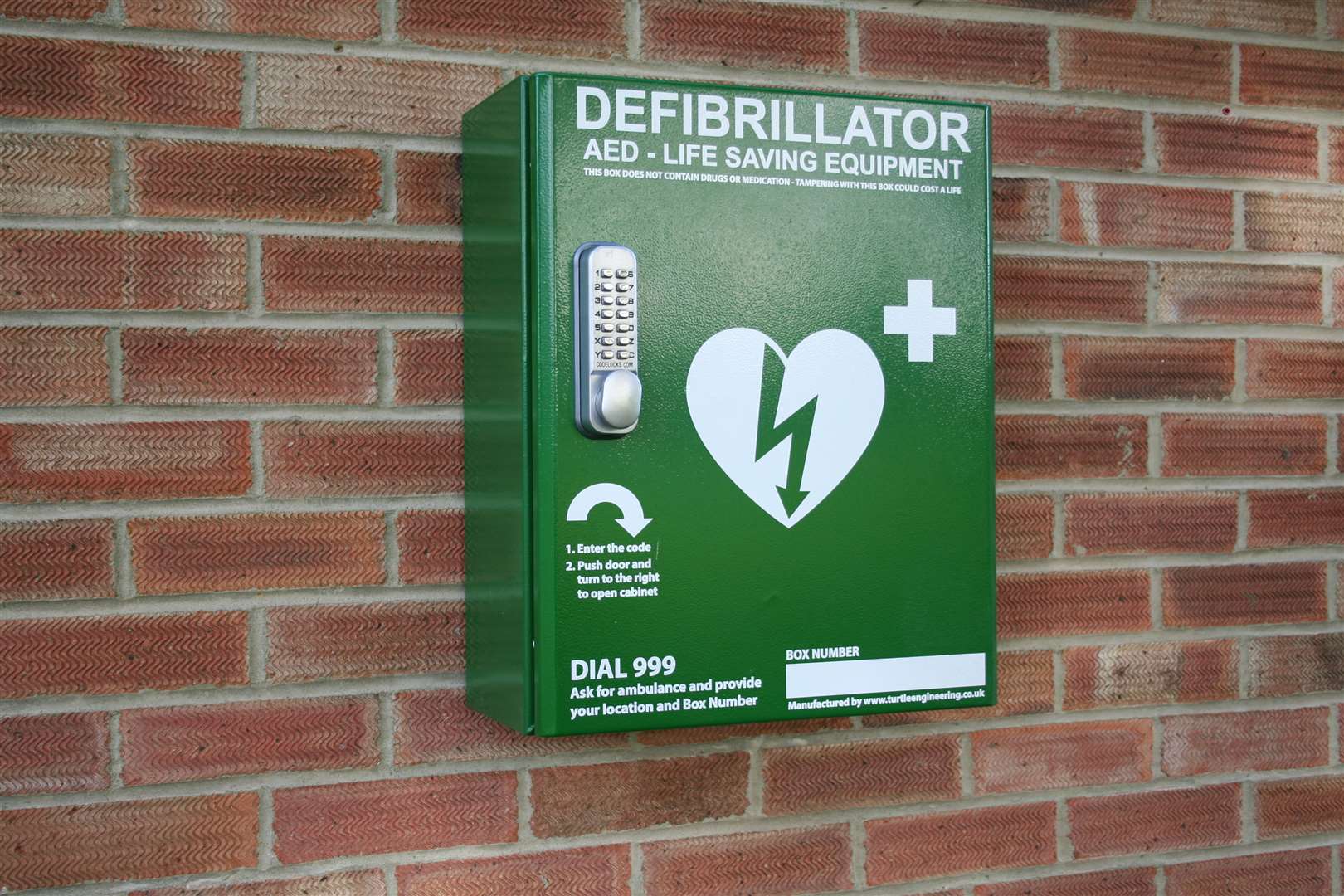 Defibrillator outside the Ash Sports Pavilion, Queens Road.