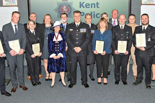 Kent Chief Constable Alan Pughsley and Kathrin Smallwood, High Sheriff of Kent, and members of the team involved in investigating last year's Dover riots.