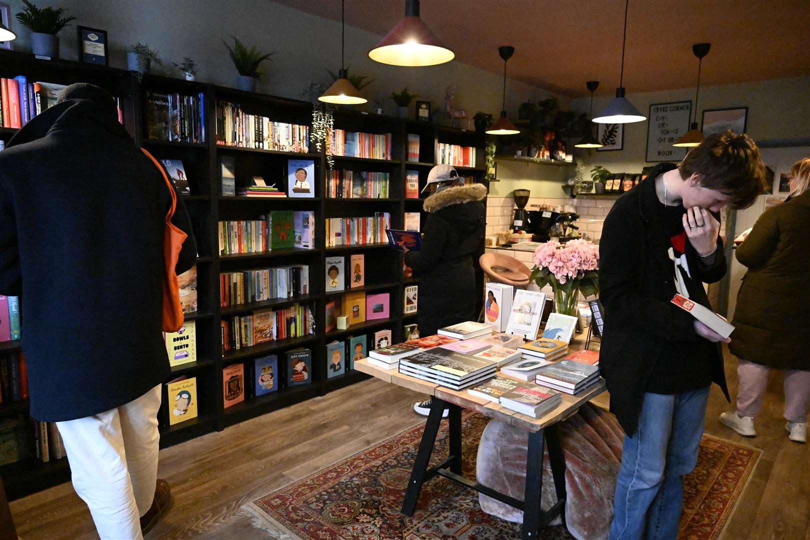 Customers search through the book shelves in support of the shop. Picture: Barry Goodwin