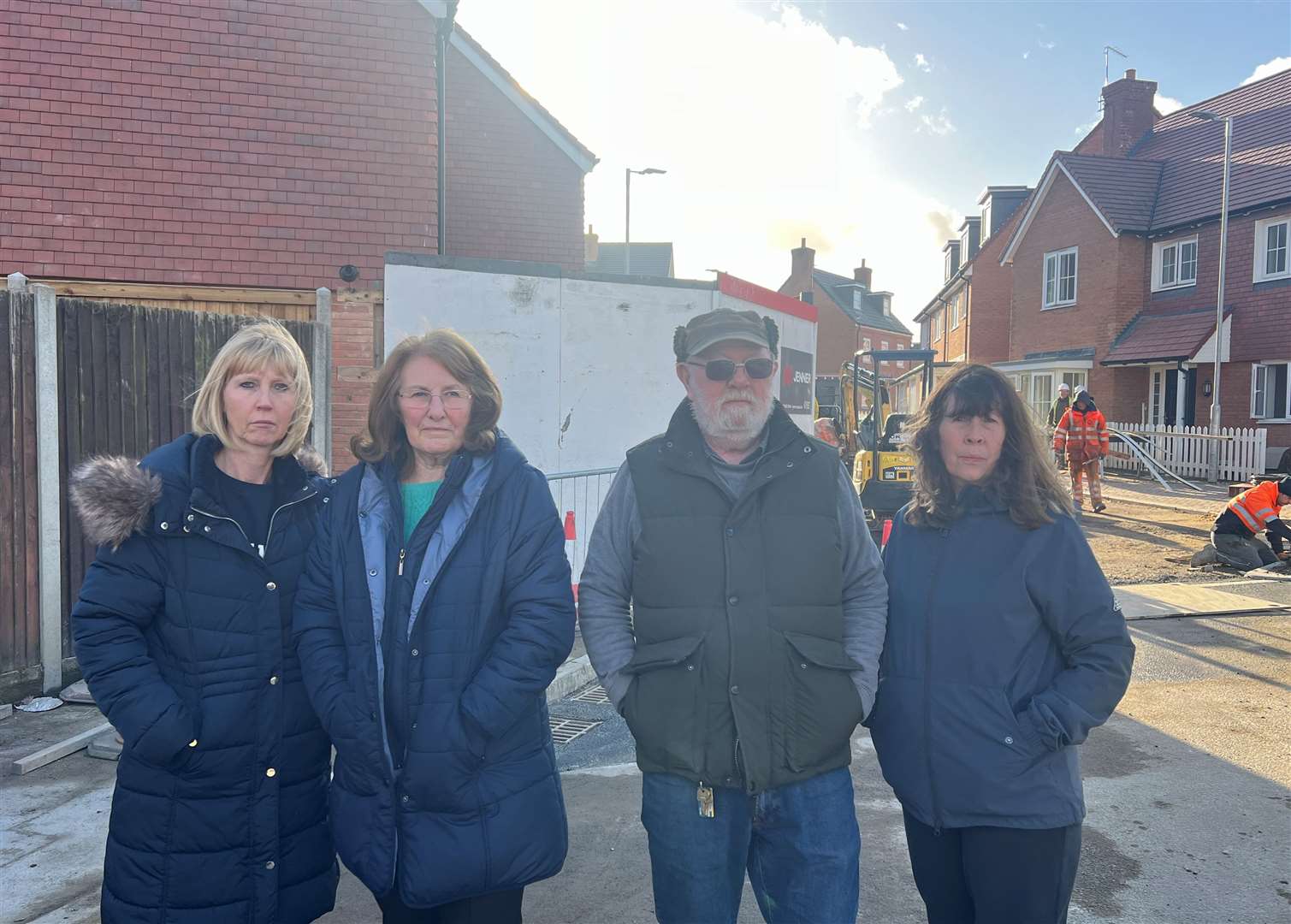 Jo Webb, of Adelaide Drive, and Lydbrook Close residents Ann Smith, Thomas and Janice Cherrett standing in front of the new Moat Homes estate in Sittingbourne