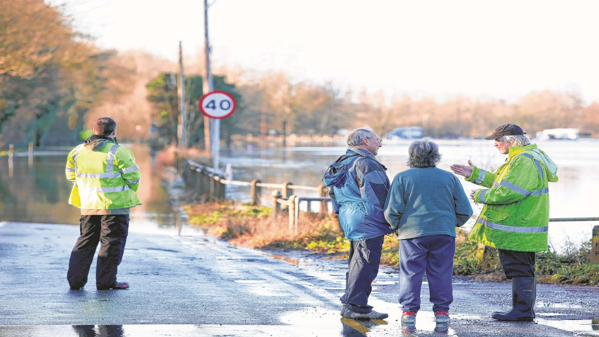 Flooding in Yalding over the New Year along Hampstead Lane and Lees Road. The Environment Agency and members of the public look at the flood water.
