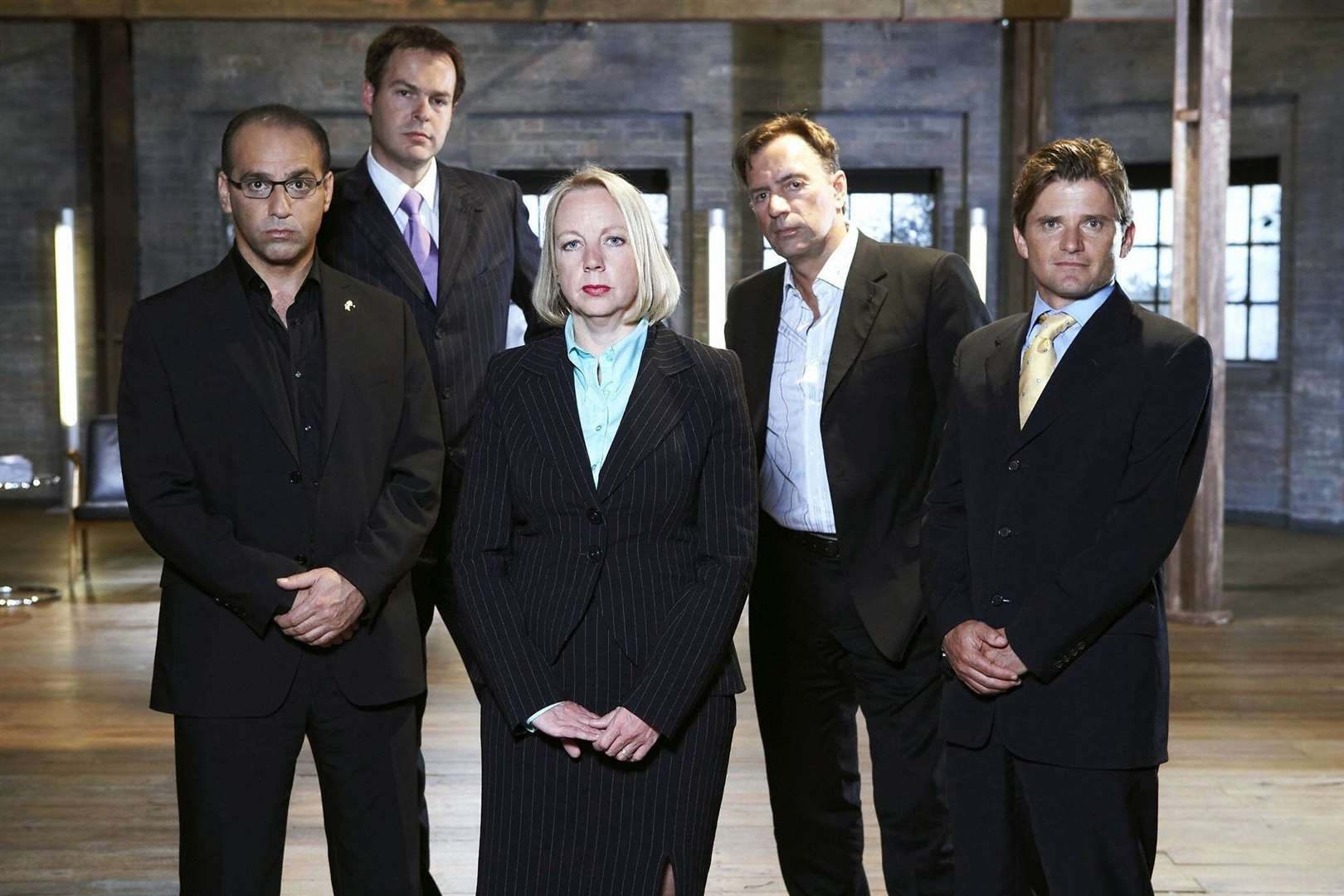 Theo Paphitis lines up alongside his fellow business leaders on the BBC's Dragons' Den in 2006. Picture: BBC