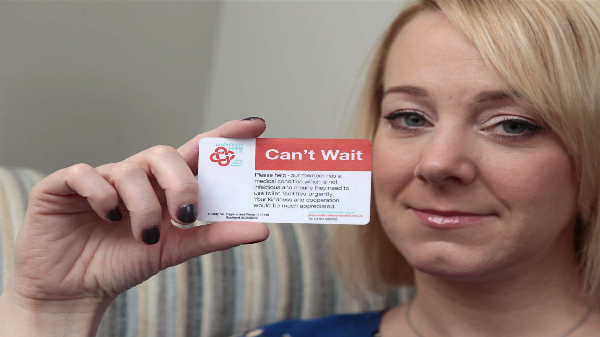 Lucy Barber, showing her NHS card. Picture: Martin Apps