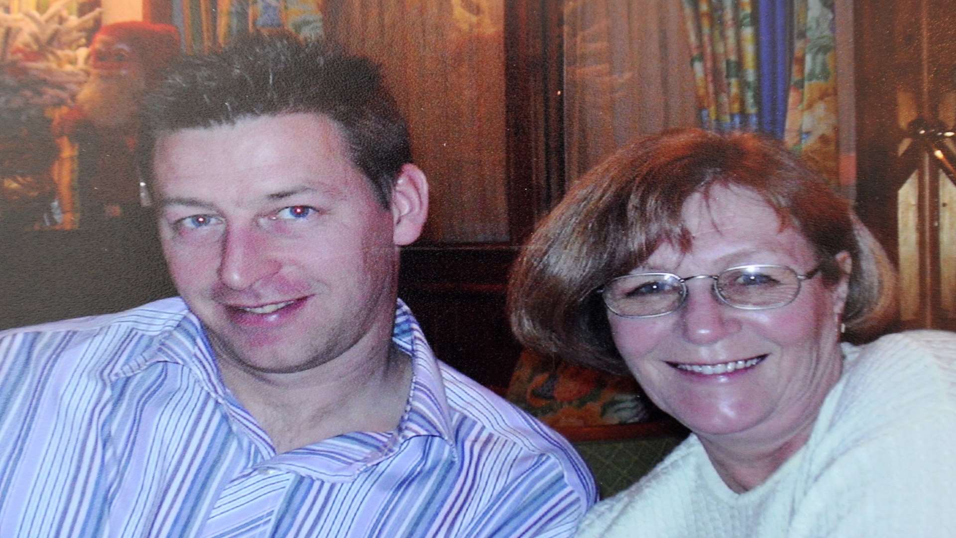 Colin Payne, who died after being punched by his stepson, with his mother Brenda