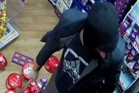 One of the masked men reported to have tried to steal from a cash machine in the Co-operative in Station Road, Longfield