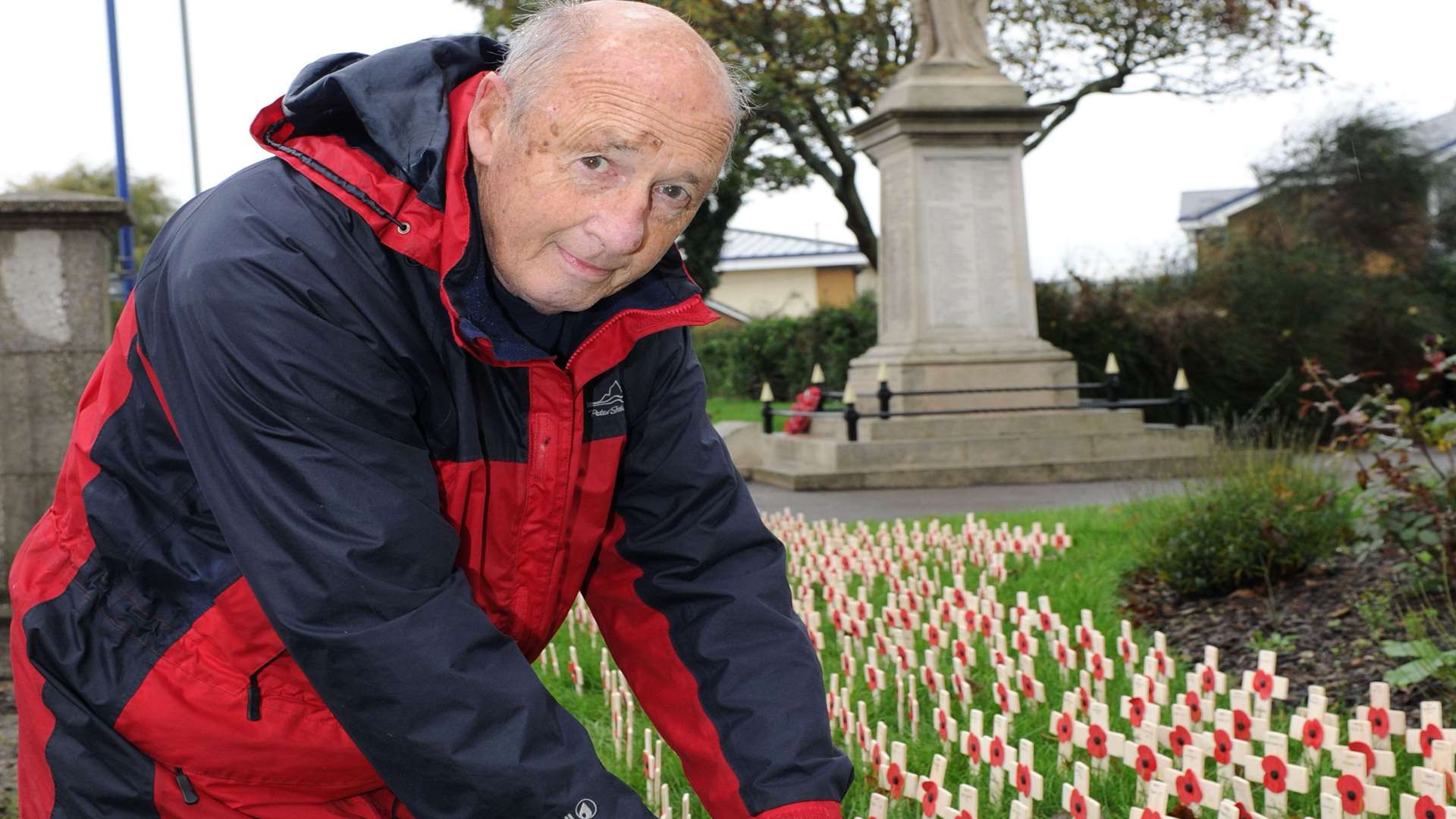Peter Macdonald planting 600 wooden crosses at Sheerness War Memorial last year to mark the number of Island soldiers and civilians killed during the First World War.