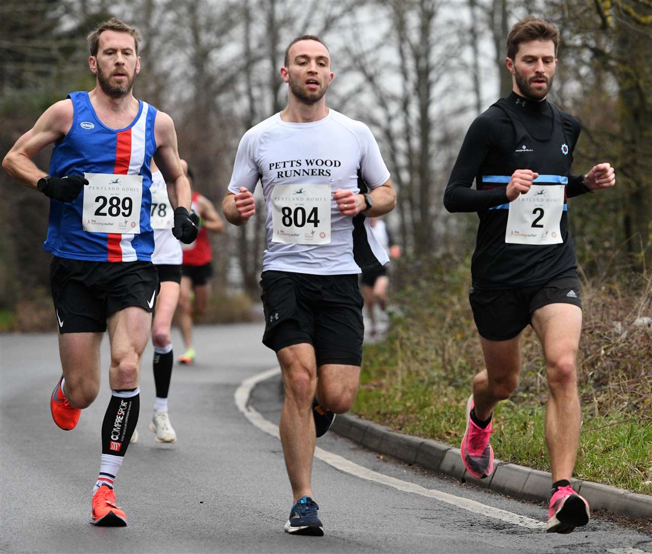 No.289 David Gillett of Folkestone Running Club, No.804 Adam Wilkinson for Petts Wood Runners and No.2 David Adams of Blackheath & Bromley Harriers. Picture: Barry Goodwin (54456173)