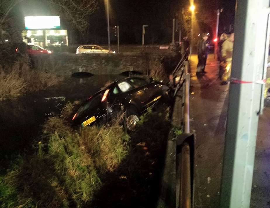 A black Ford Focus crashed into the River Dour. Picture: Luke Jordan