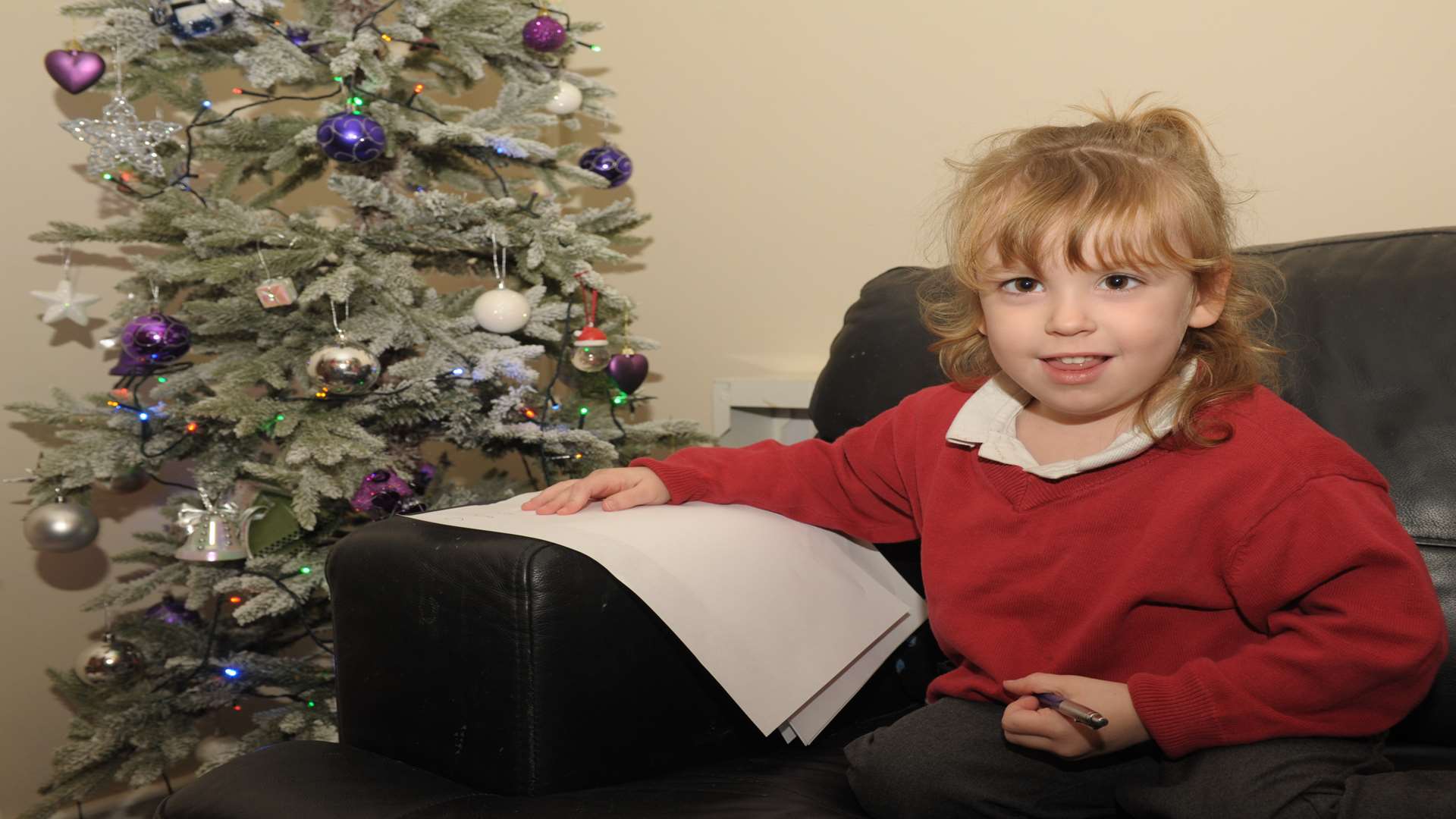 Paige Stewart writing her letter to Santa