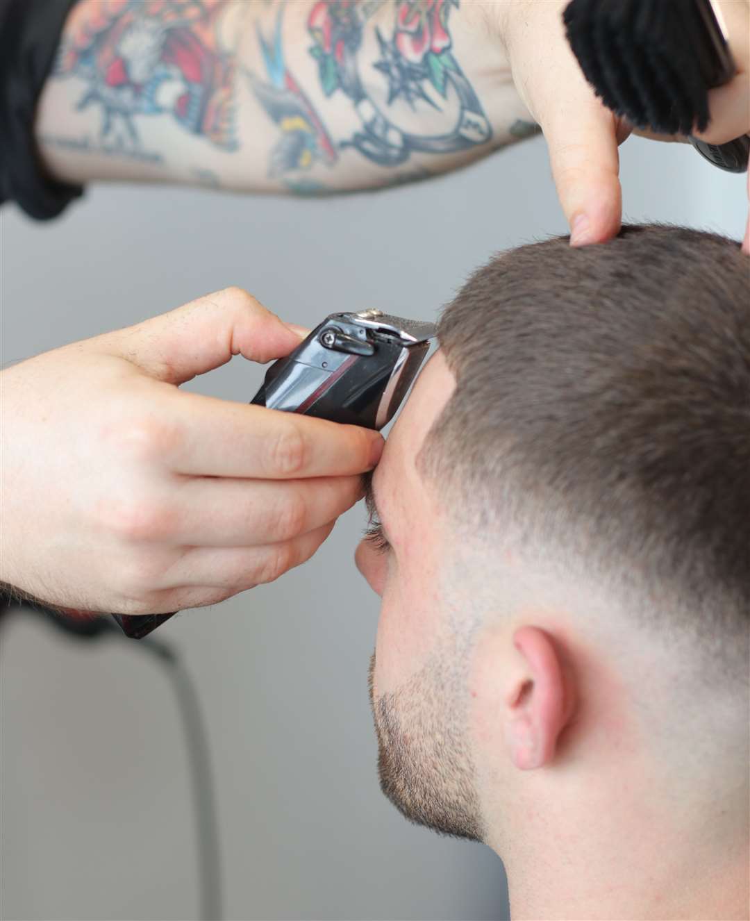 Jake Cox offers a range of cuts and treatments at his new barbershop focused on men's mental health. Photo: Bruce Middlemiss Photography