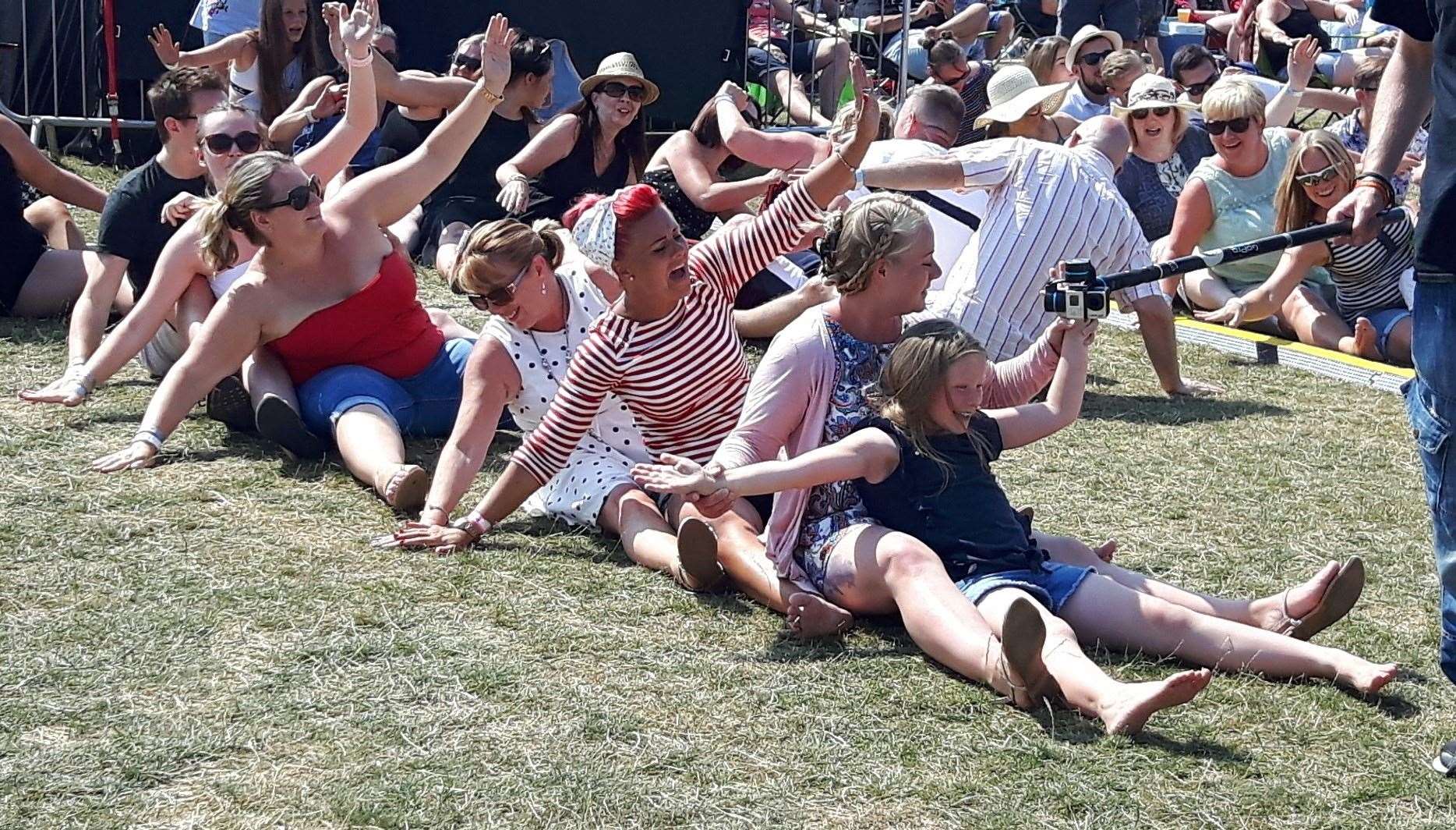 The crowd gets down to dance Oops Upside Your Head at Iwade Rock 2018