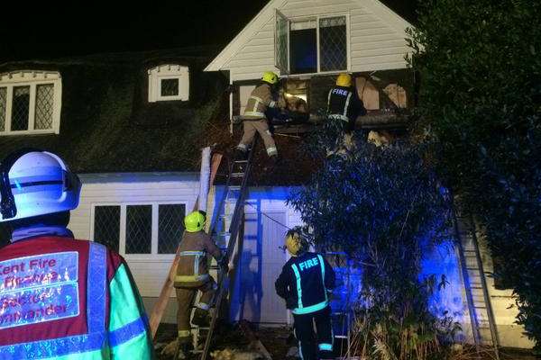 Firefighters tackle the blaze at Rowhill Grange