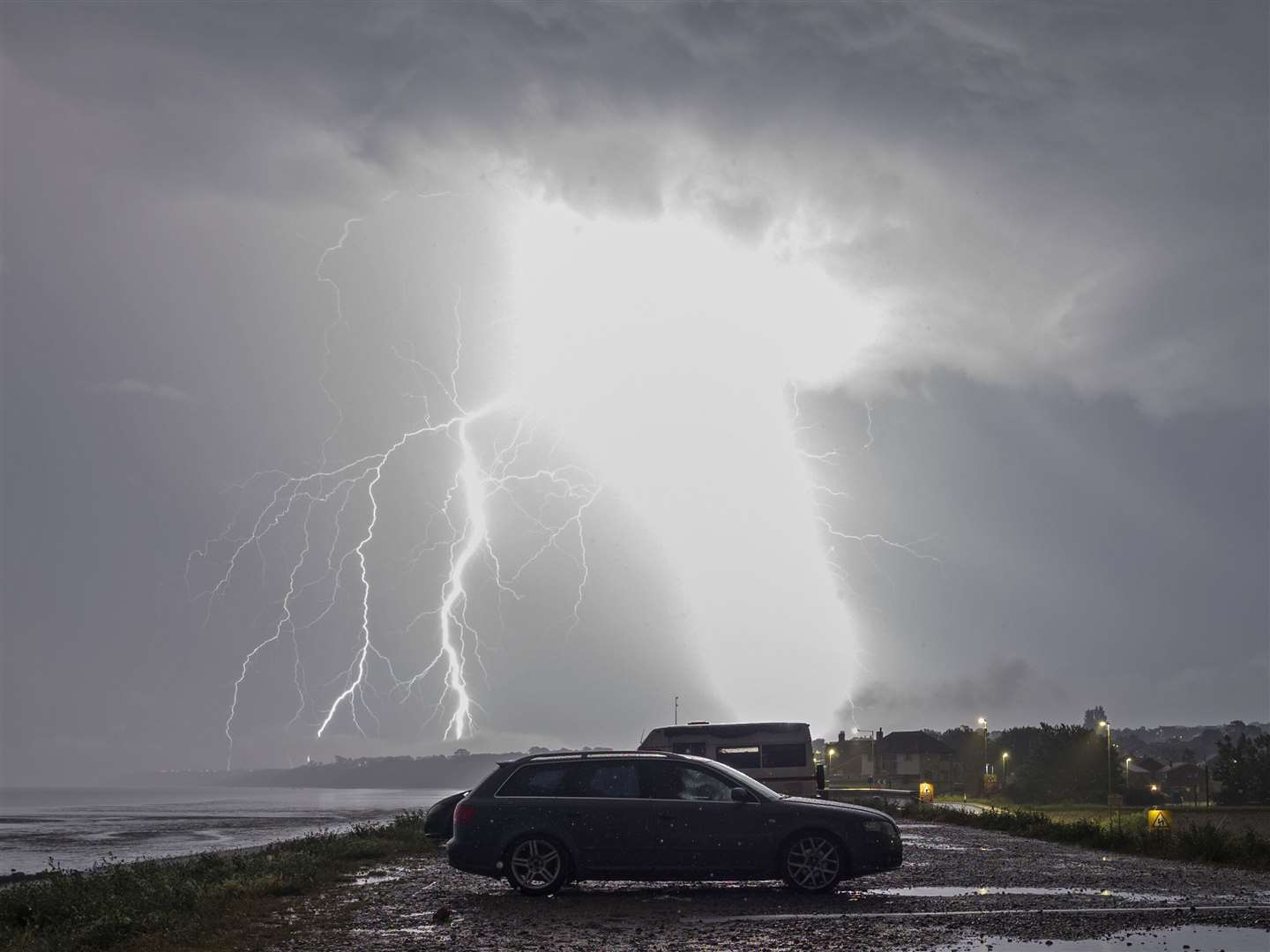 Lightning strikes Minster Cliffs on Sheppey during a thunderstorm on Thursday. Picture: James Bell
