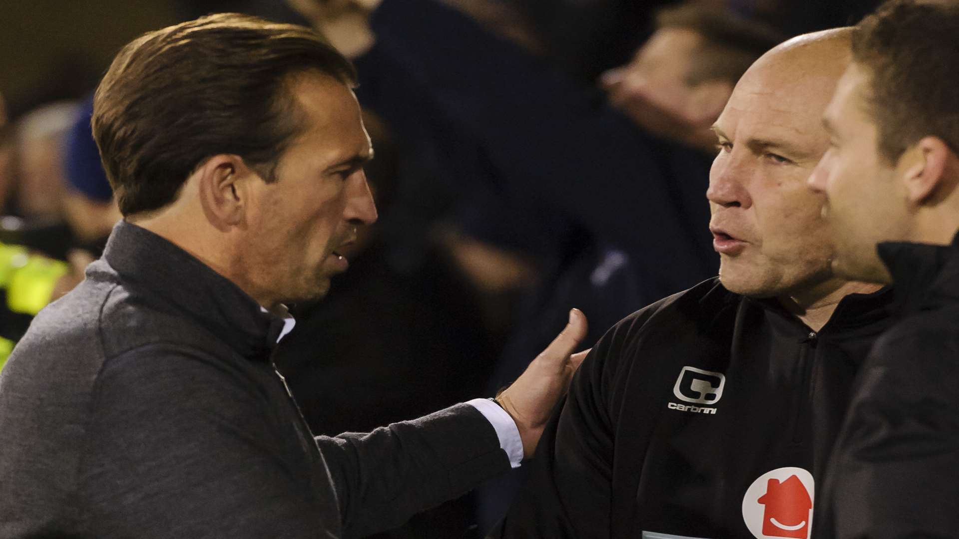 Gills boss Justin Edinburgh welcomes Walsall manager Jon Whitney to Priestfield Picture: Andy Payton