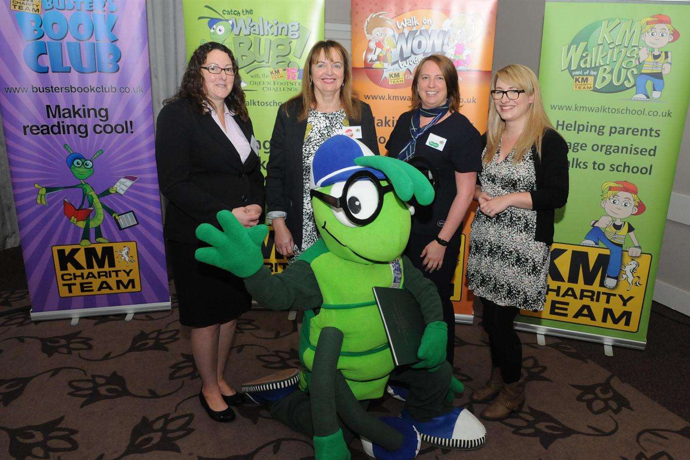 Formal launch of Buster's Book Club at the KM Charity Team's annual forum at Mercure Great Danes Hotel, Maidstone, with sponsors Nicki Curry (Three R's Teacher Recruitment), Elizabeth Carr (Mini Babybel), Ruth Warren (Specsavers) and Sarah Butler (Orbit South).