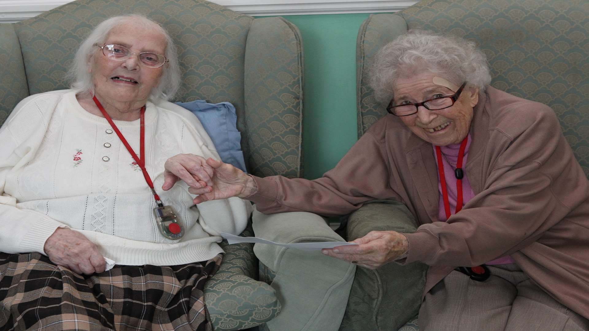 From left to right, Beryl Goodburn, 95 and Peggy Rouse, 97 reunited at The Hollies (Evergreen) Residential Care Home in Gravesend.