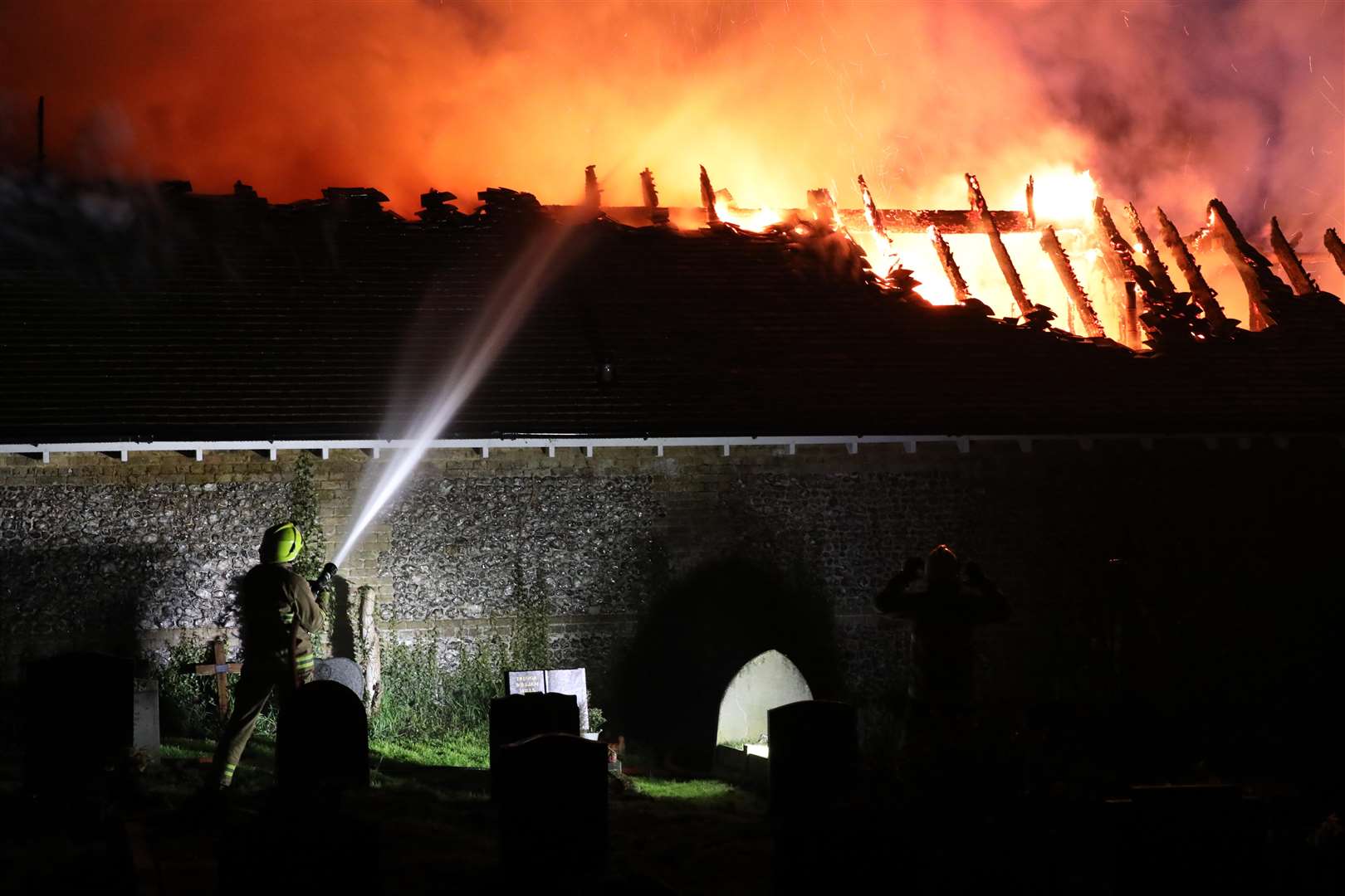 Firefighters battled a roof blaze in a property near Farningham High Street on Saturday night. Picture by Ben Dzierzek