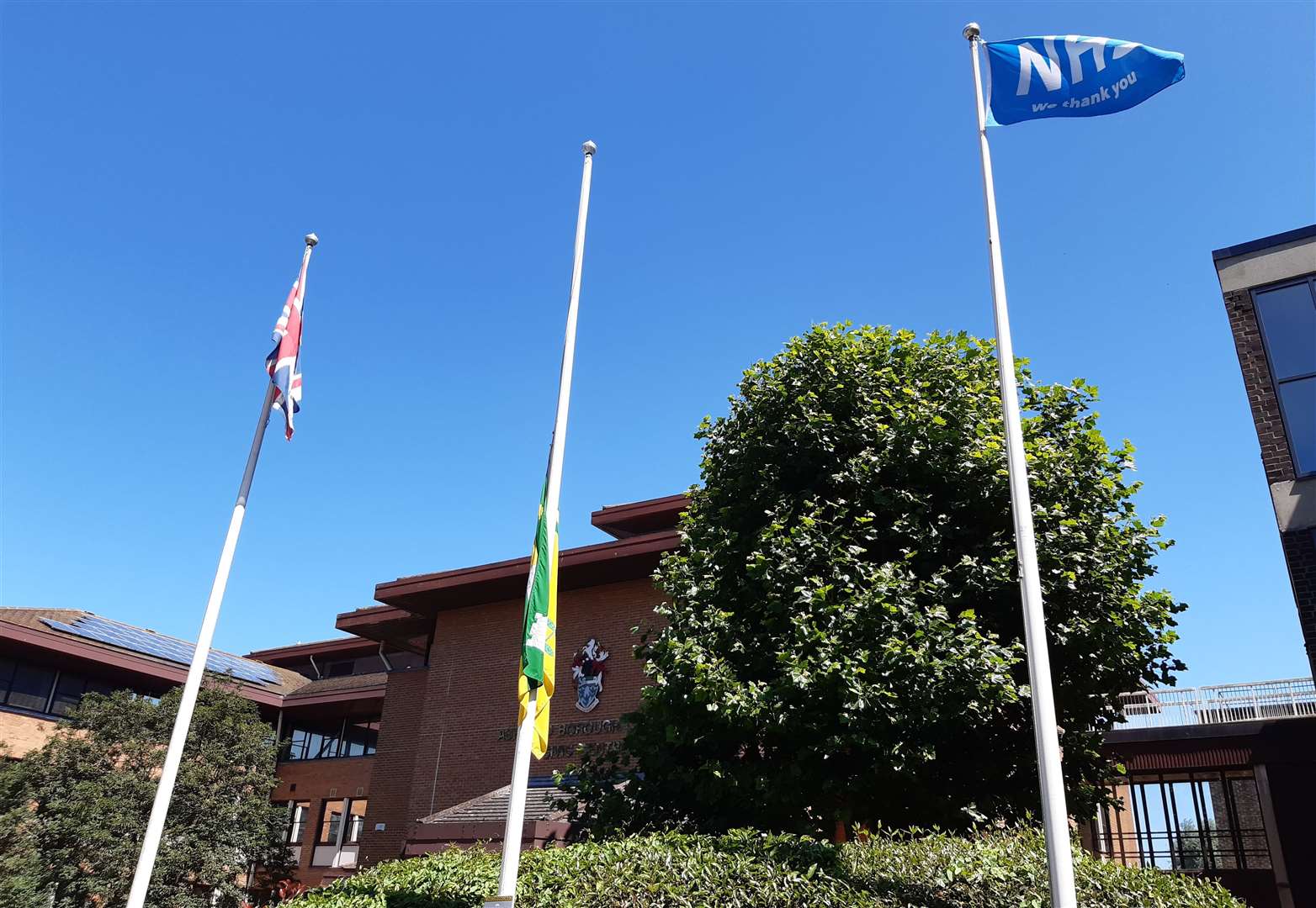 The Ashford Borough Council flag is flying at half-mast outside the Civic Centre