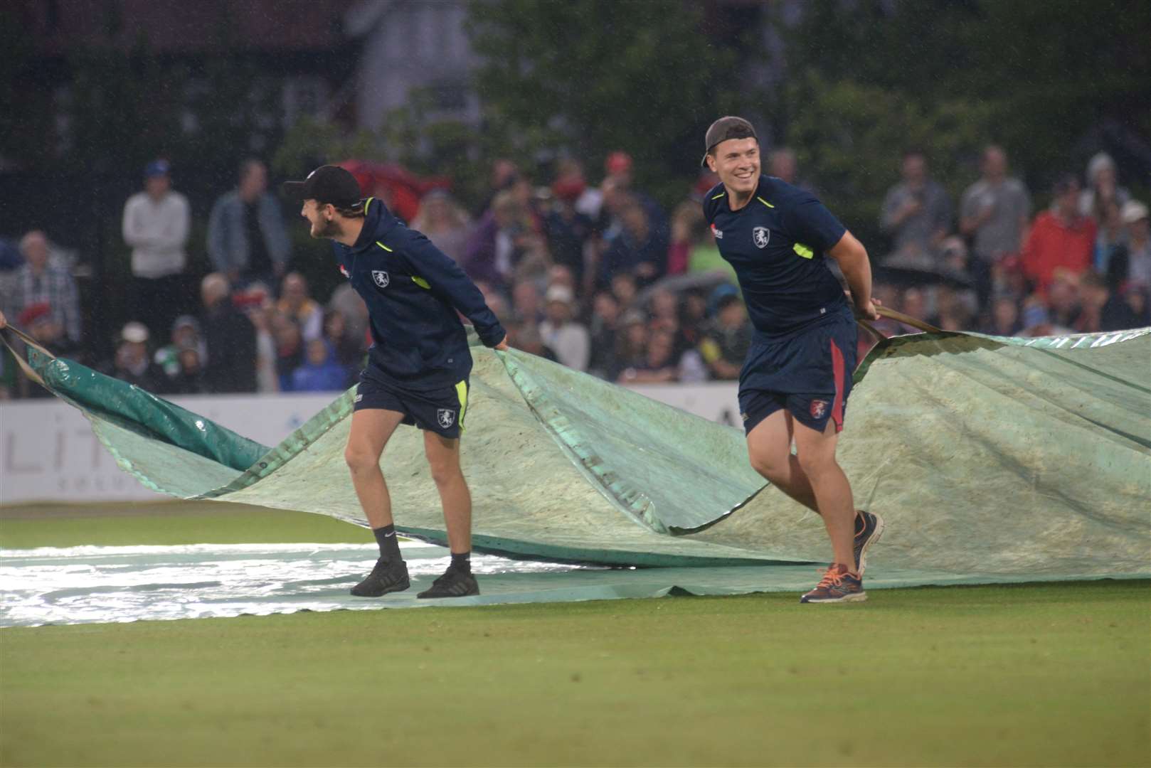The covers come on ending Kent's T20 match with Surrey. Picture: Chris Davey
