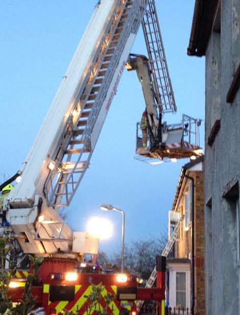 Firefighters use a height vehicle to tackle the blaze