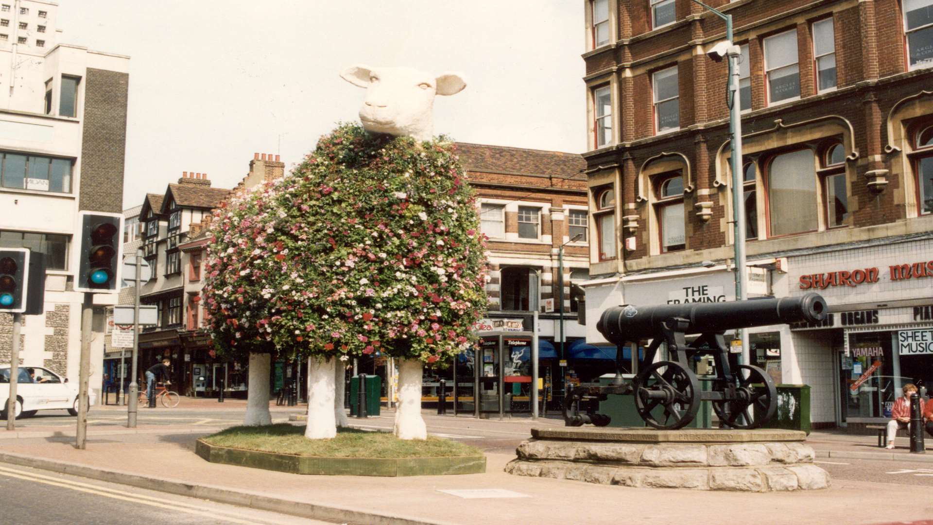 The giant floral sheep sat in Maidstone High Street.
