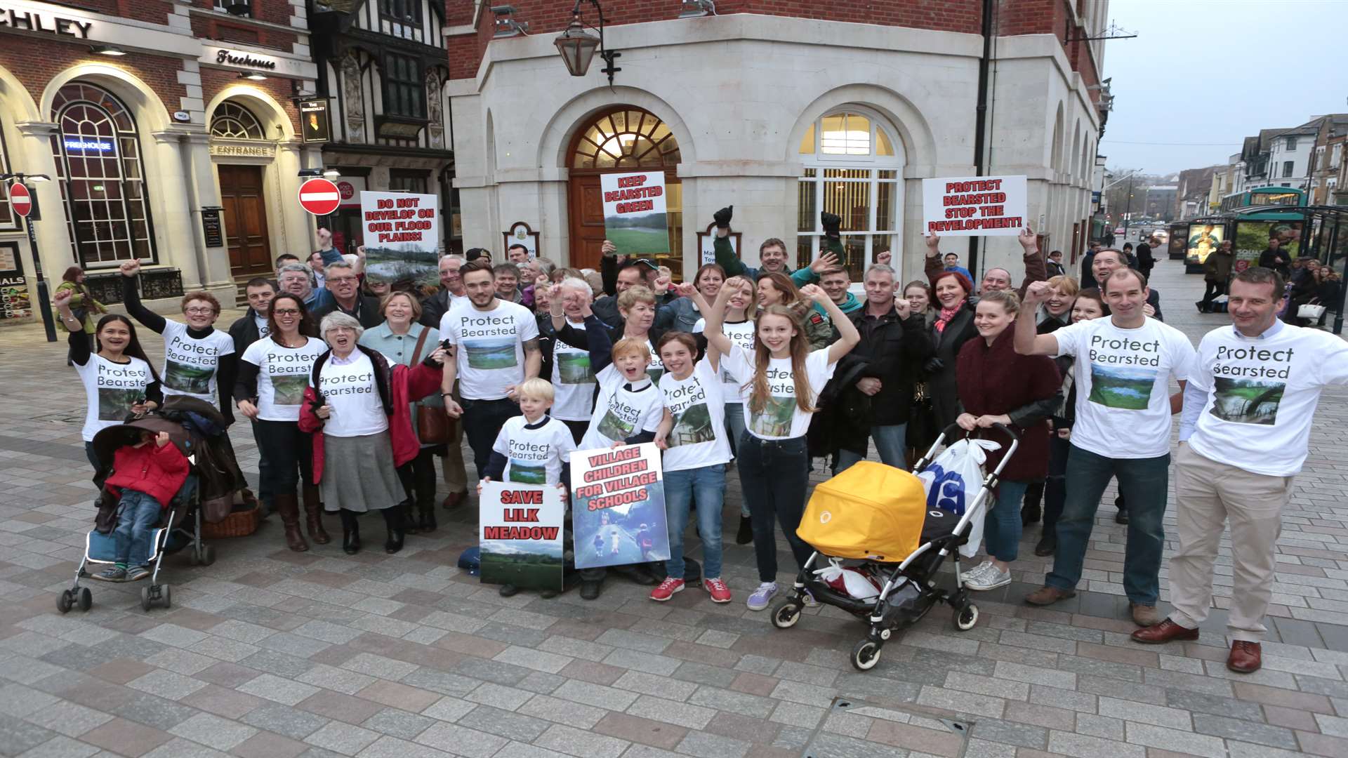 Protesters gathered outside the Town Hall when initial plans were approved in April.