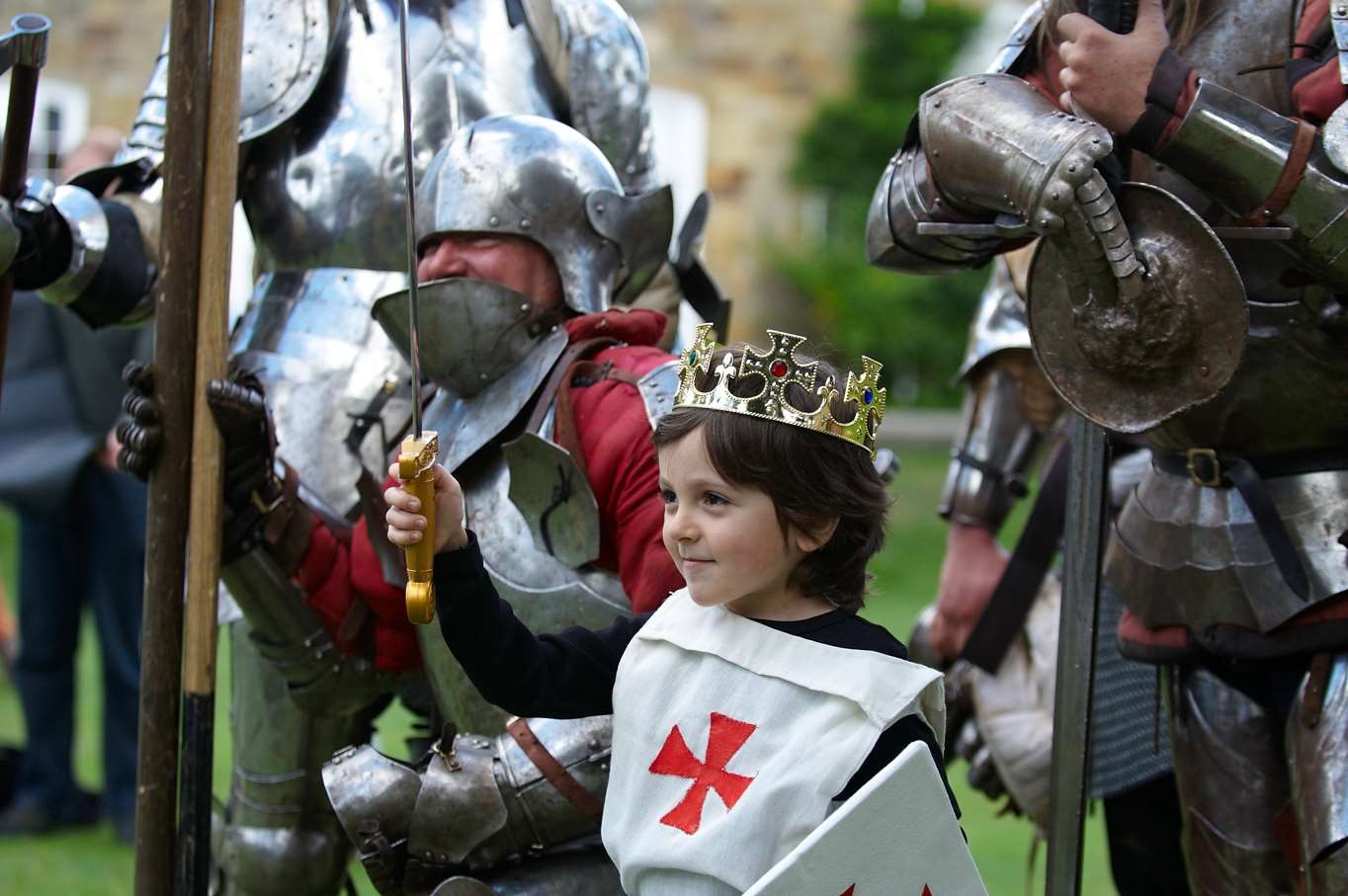 A young Knight was suited up in medieval armour