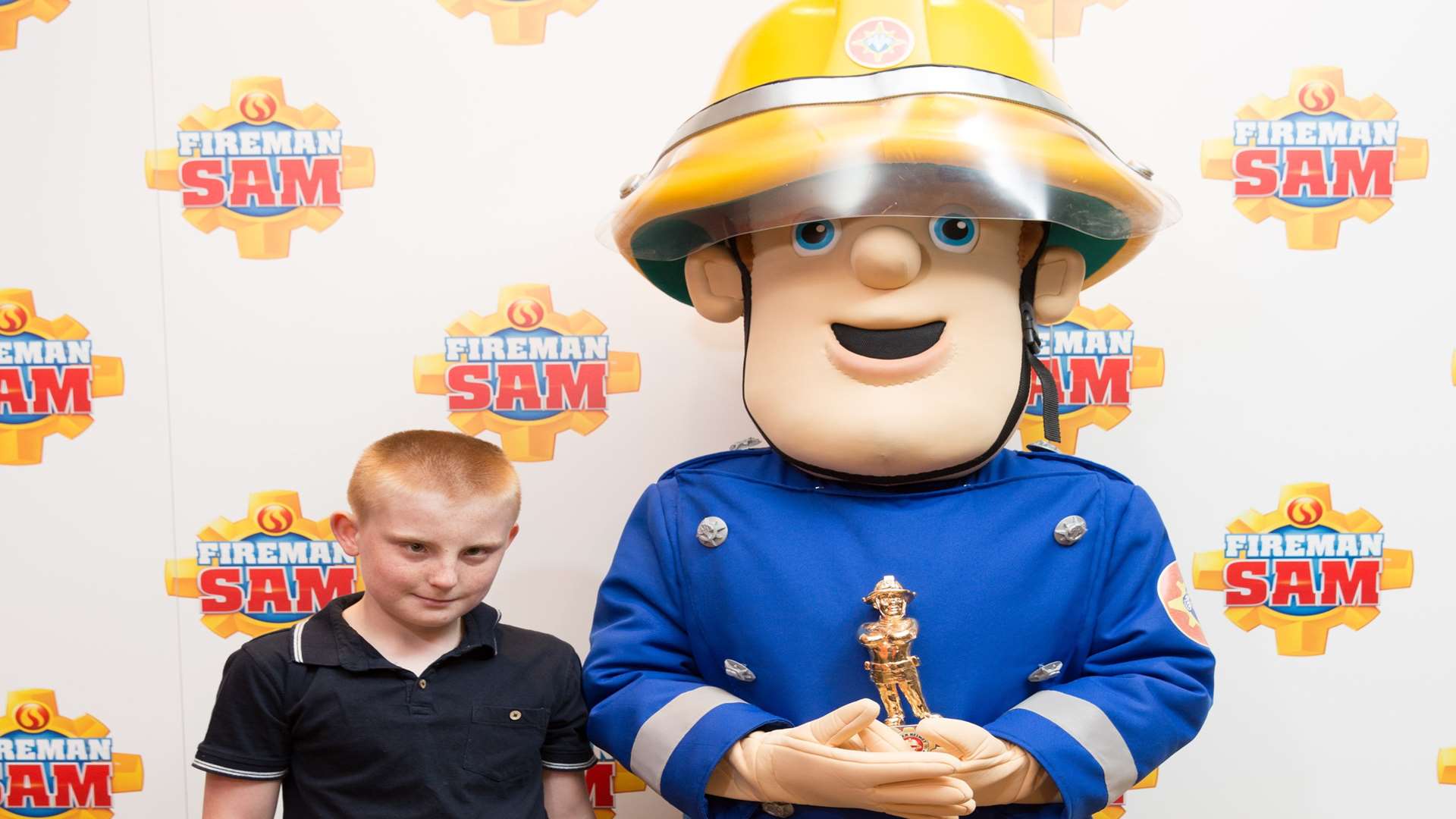 Jack-Dean Lower receiving his Fireman Sam Golden Helmet Award