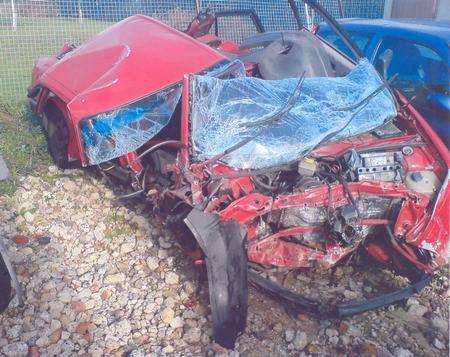 The mangled wreckage of Jan McKenzie's Audi 80