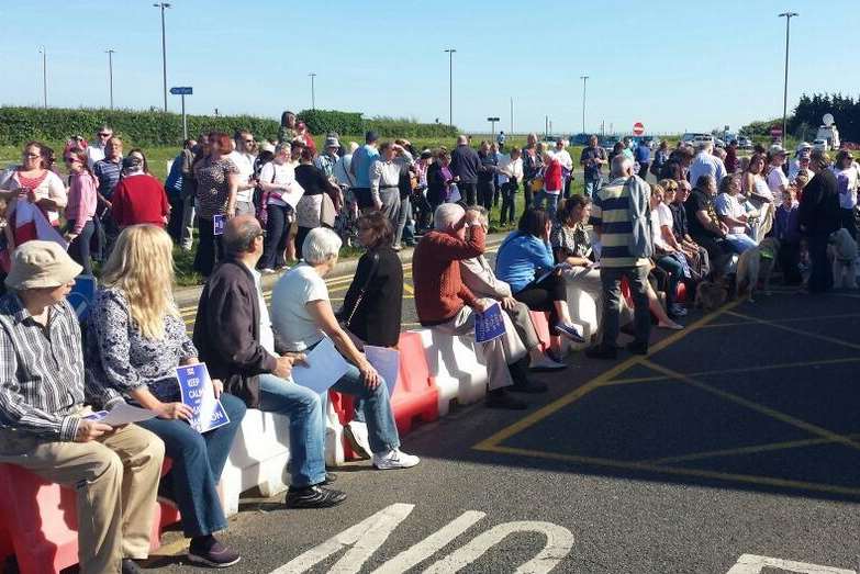 Scores of people gather outside Manston airport as staff prepared to leave for the final time