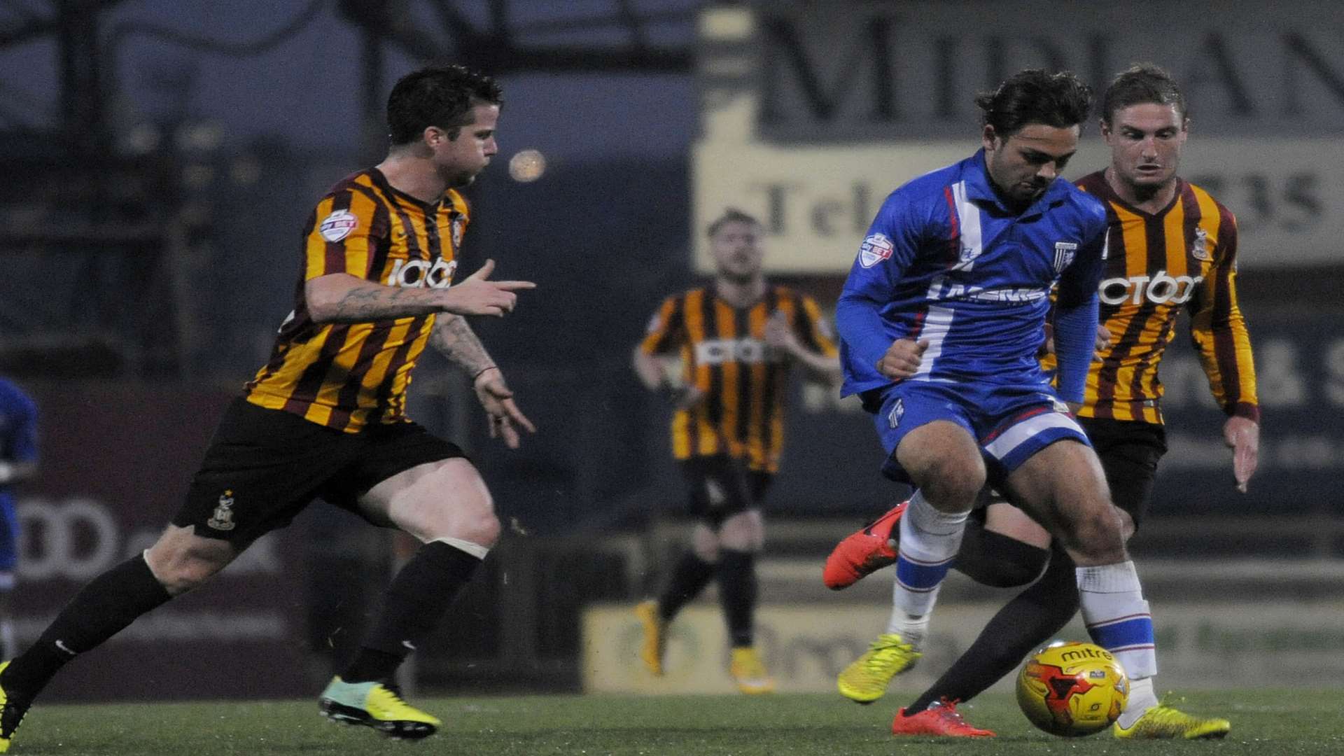 Bradley Dack in the thick of the midfield action
