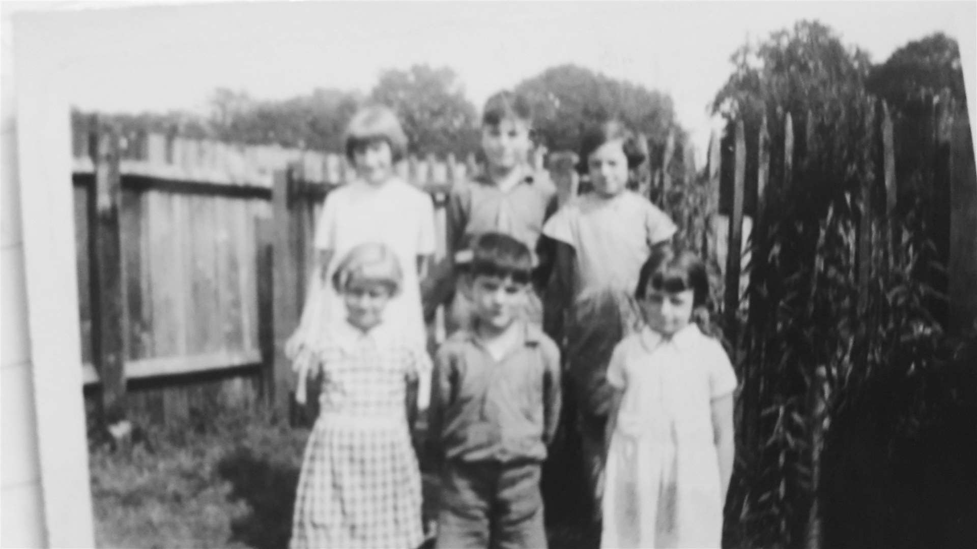 Frances (back row, far right) and Frank (back row, middle) were friends from an early age.