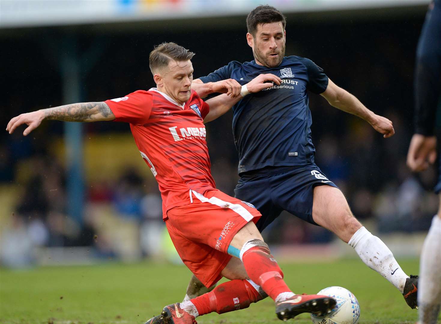 Gillingham's Mark Byrne challenges Southend's Michael Timlin. Picture: Ady Kerry