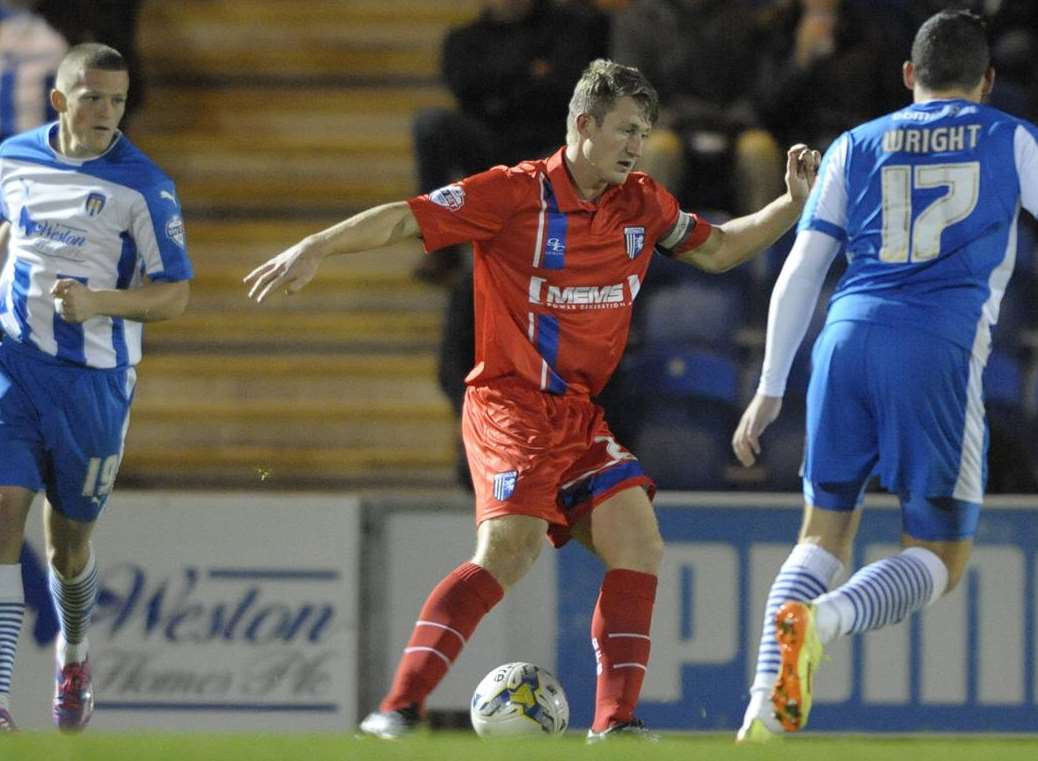 Callum Davies wears the captain's armband for Gillingham at Colchester Picture: Barry Goodwin