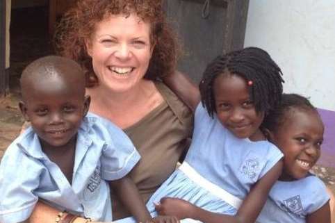 Former IoD Kent boss Debbie Cameron with youngsters in Uganda