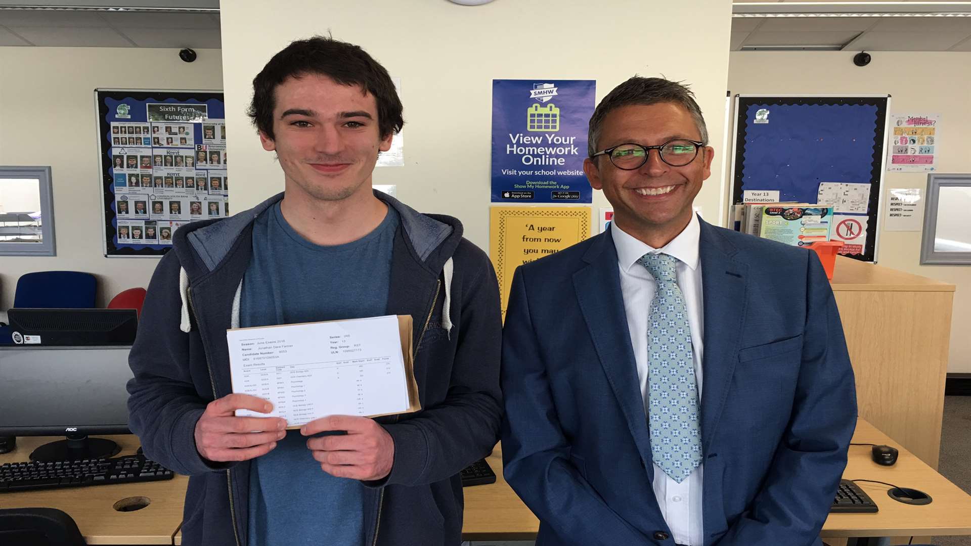 Jonathon Farmer from Wrotham School achieved AAC in his A-levels. He is pictured with Mr Carter, his head teacher