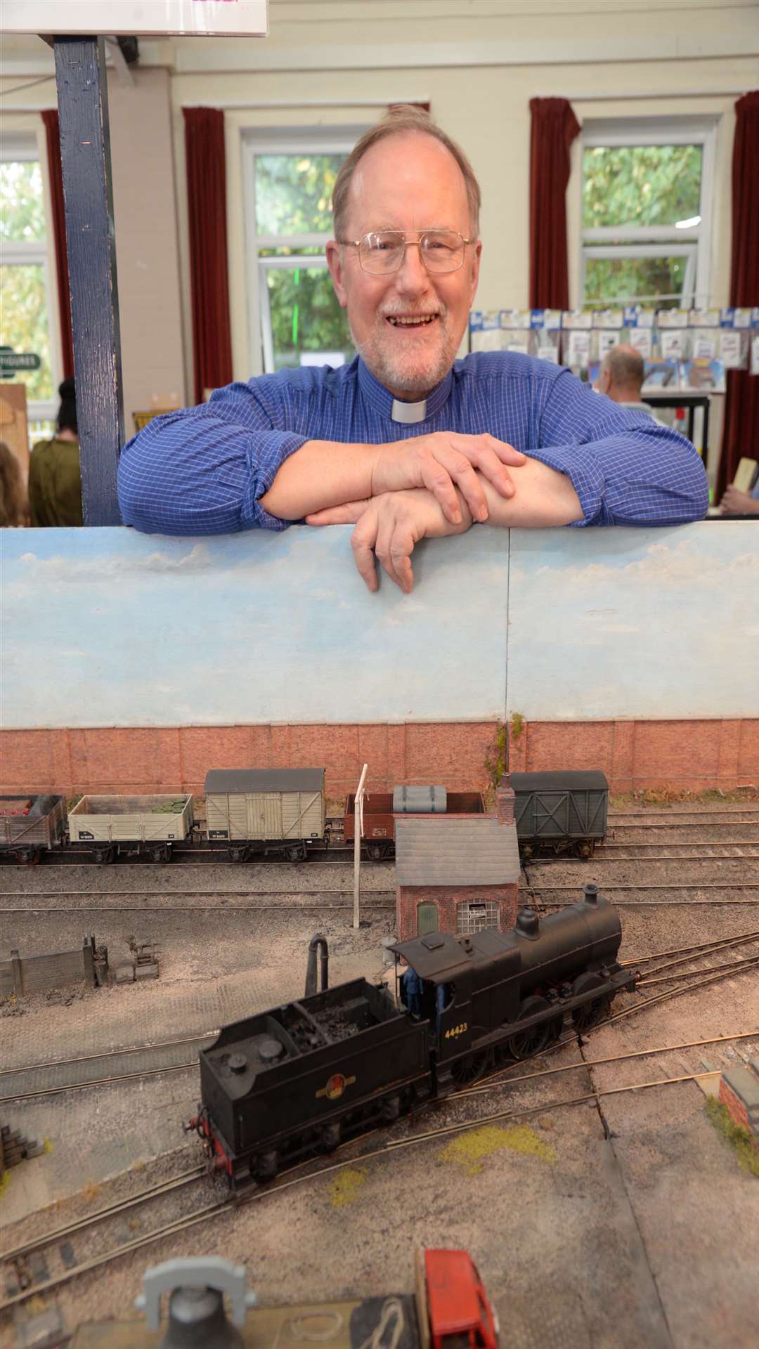 Revd Richard Arding at his last annual charity model railway exhibition in St Michael's Church Hall, Wilmington on Saturday. Picture: Chris Davey