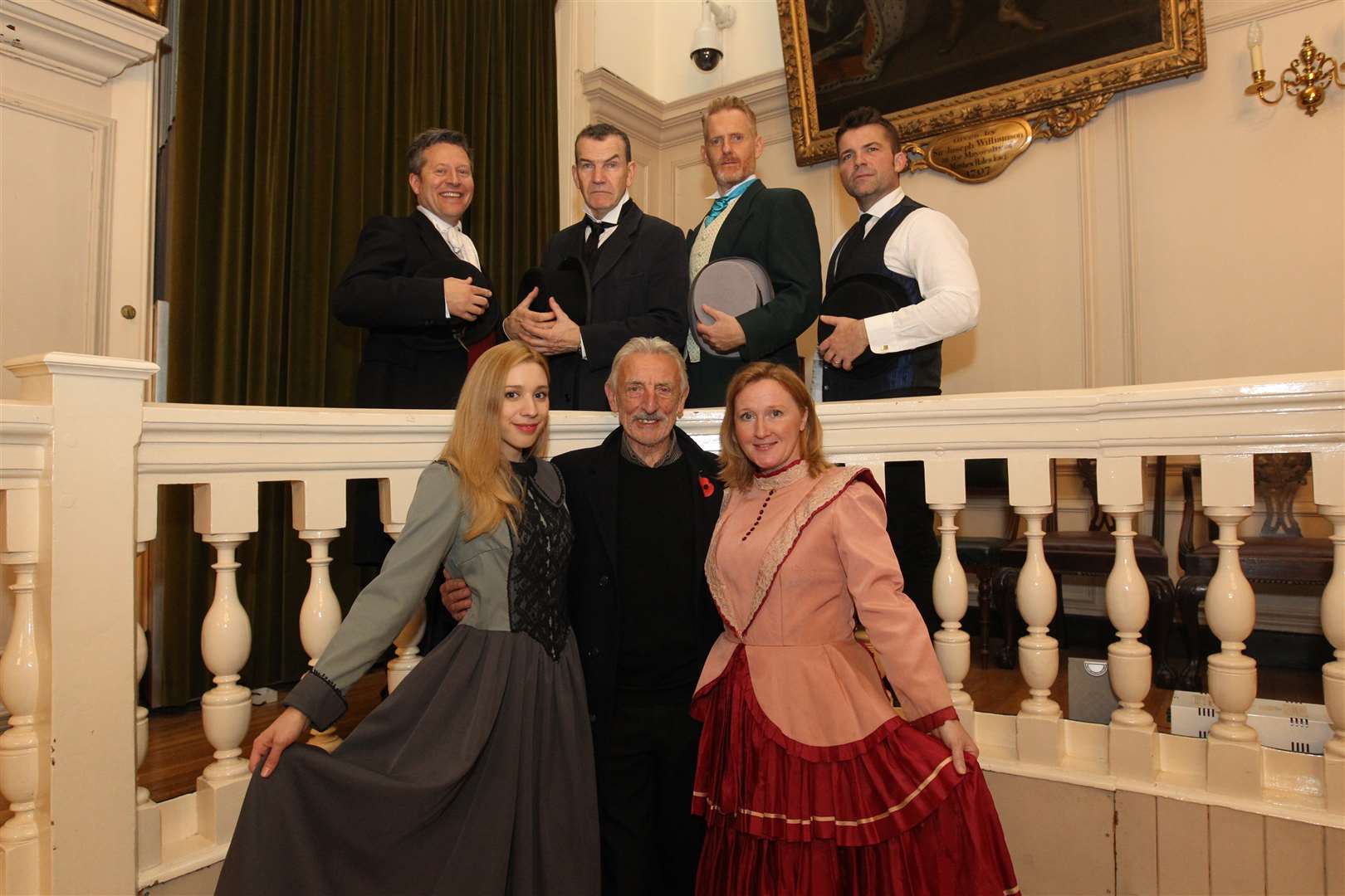 Eric Richard from the Bill with the cast of the Dickens production.