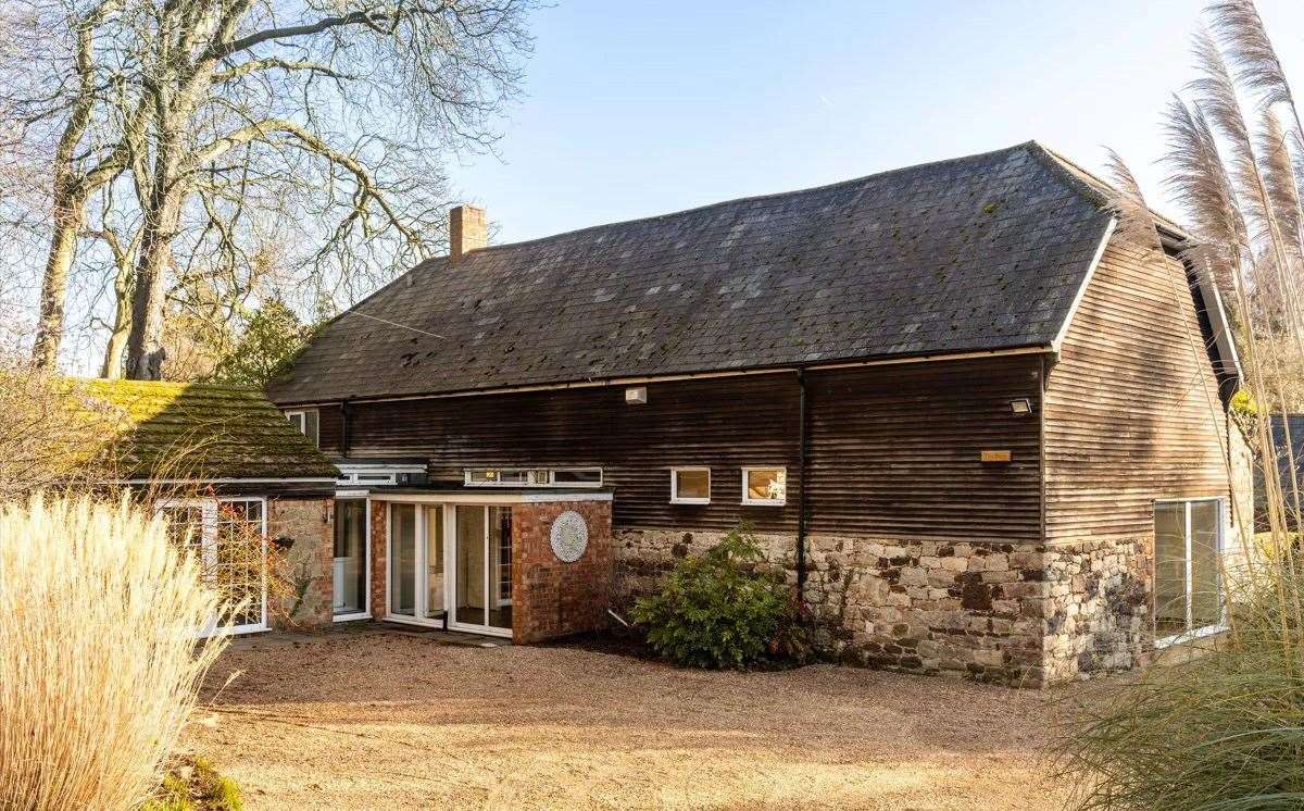 A converted barn on the grounds of Great Comp Garden is up for sale. Picture: Knight Frank