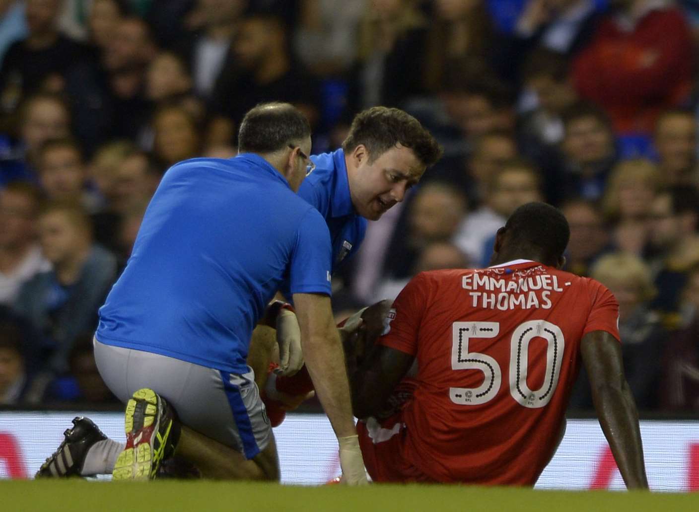 Jay Emmanuel-Thomas is treated by the Gills physios at Tottenham Picture: Barry Goodwin