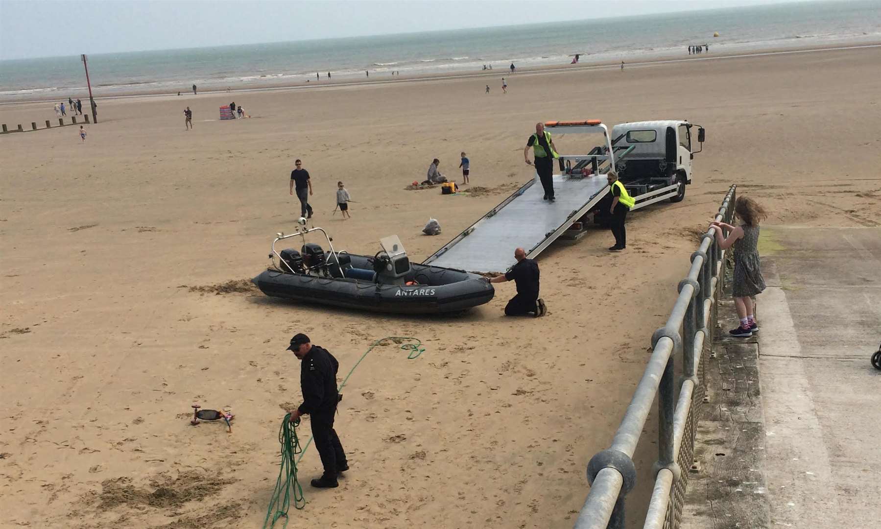 The scene on Dymchurch beach after a boat full of migrants was rescued off the coast