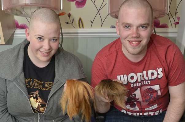 Kirsty Sawyer and Paul Miles, who both escaped a fire, shaved their heads for an alopecia charity