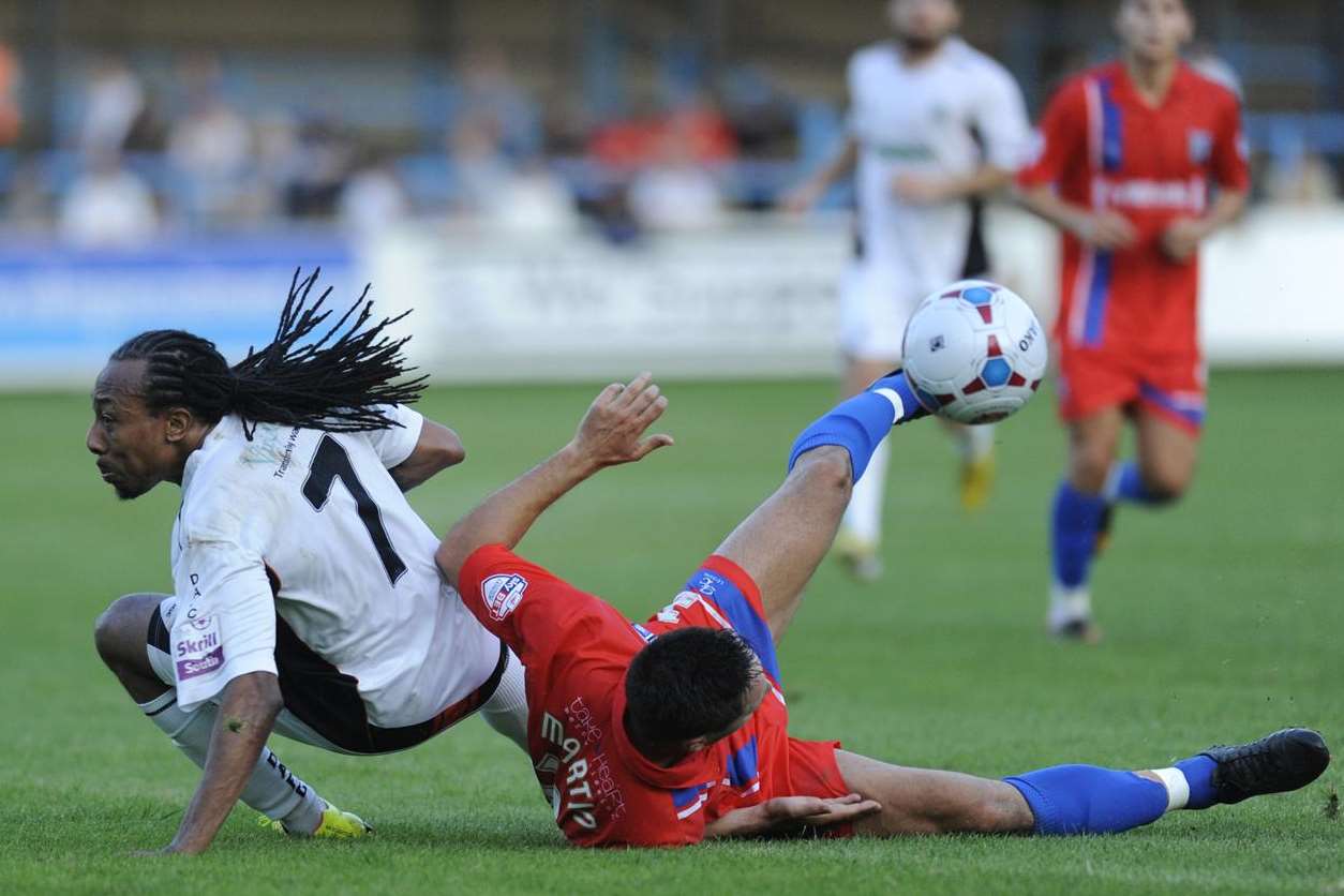 Ricky Modeste (left) in action for Dover in the 1-0 fpre-seasonwin against Gillingham at Crabble earlier this season.